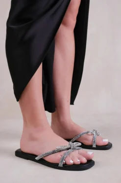 Sandals*Where's That From Earth' Flat Slip On Sandals With Bow Diamante Detail Black