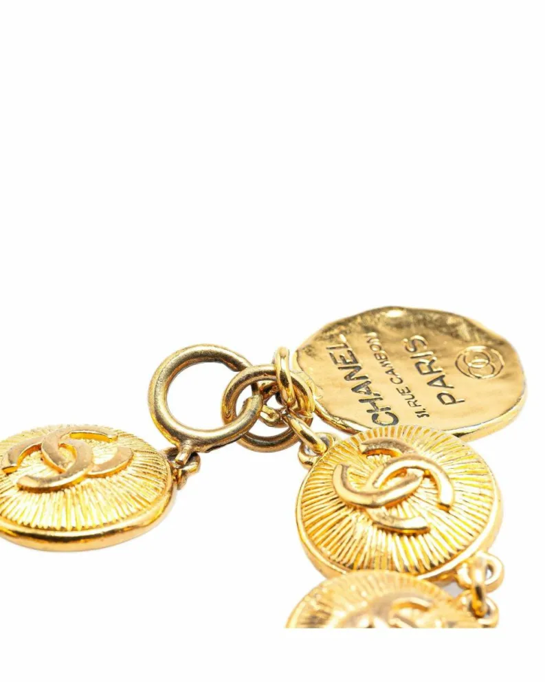 Bracelets*Chanel Preloved Plated Medallion Bracelet with Spring Ring Closure Gold