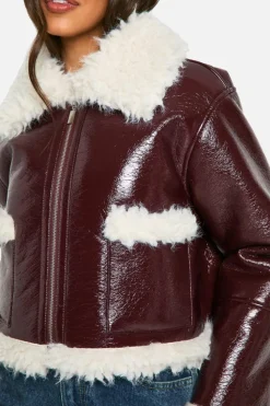 Up To 80% Off Winter Warmers|Aviator Jackets*boohoo Vinyl Faux Fur Trim Jacket burgundy